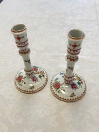 A pair of Chinese famille rose candlesticks with floral design, Qianlong