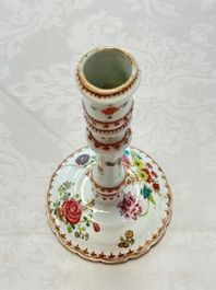 A pair of Chinese famille rose candlesticks with floral design, Qianlong