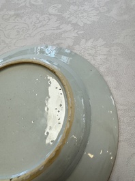 A pair of Chinese famille rose 'Peacock and Flowers' plates, Yongzheng