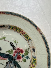 A pair of Chinese famille rose 'Peacock and Flowers' plates, Yongzheng