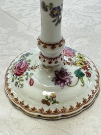 A pair of Chinese famille rose candlesticks with floral design, Qianlong