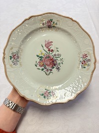 Two Chinese famille rose serving dishes and six plates with floral design, Qianlong