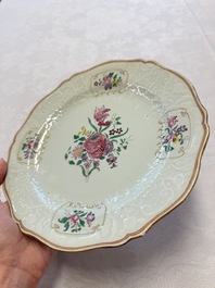 Two Chinese famille rose serving dishes and six plates with floral design, Qianlong