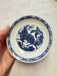 A Chinese blue and white 'Qilin' saucer dish and a 'Frog' saucer dish, Jiajing/Wanli