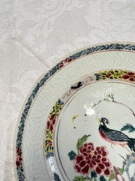 A pair of Chinese famille rose 'Peacock and Flowers' plates, Yongzheng
