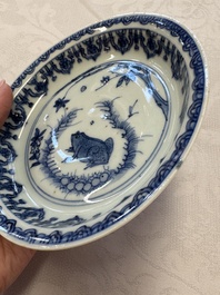 A Chinese blue and white 'Qilin' saucer dish and a 'Frog' saucer dish, Jiajing/Wanli
