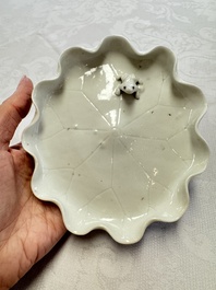 A Chinese Dehua blanc de Chine 'Lotus Leaf and Frog' brush washer on a wooden stand, Kangxi/Yongzheng