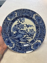 A Chinese blue and white dish with floral design and a famille rose 'HeHe Erxian' plate, Kangxi/Yongzheng