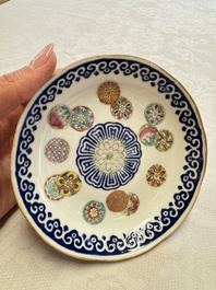 Two Chinese famille rose 'Brocade Ball' saucers, Tongzhi mark and of the period