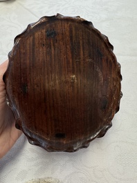 A Chinese Dehua blanc de Chine 'Lotus Leaf and Frog' brush washer on a wooden stand, Kangxi/Yongzheng
