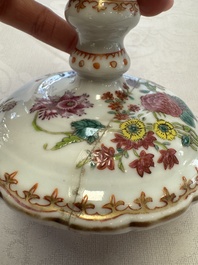 A pair of Chinese famille rose candlesticks with floral design, Qianlong