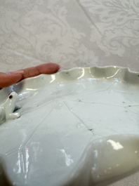 A Chinese Dehua blanc de Chine 'Lotus Leaf and Frog' brush washer on a wooden stand, Kangxi/Yongzheng