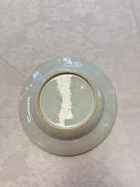 A pair of Chinese famille rose 'Peacock and Flowers' plates, Yongzheng