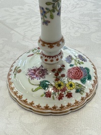 A pair of Chinese famille rose candlesticks with floral design, Qianlong
