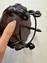 A Chinese Dehua blanc de Chine 'Lotus Leaf and Frog' brush washer on a wooden stand, Kangxi/Yongzheng
