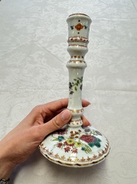 A pair of Chinese famille rose candlesticks with floral design, Qianlong