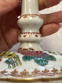 A pair of Chinese famille rose candlesticks with floral design, Qianlong