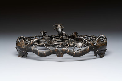 A large Chinese archaistic bronze 'Dragon' stand, Ming