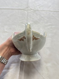 A Chinese armorial plate, a serving dish and a sauce boat with the arms of de Heere for the Dutch market, Qianlong, ca. 1735-1765