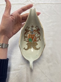 A Chinese armorial plate, a serving dish and a sauce boat with the arms of de Heere for the Dutch market, Qianlong, ca. 1735-1765