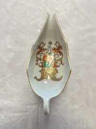 A Chinese armorial plate, a serving dish and a sauce boat with the arms of de Heere for the Dutch market, Qianlong, ca. 1735-1765
