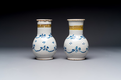 A varied group of six blue, white and polychrome Brussels faience jugs, 18th C.