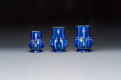 Three blue-ground faience jugs, probably Saint-Omer, North of France, 18/19th C.