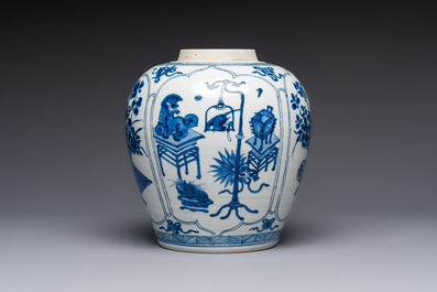 A Chinese blue and white 'Antiquities and Flower Baskets' vase with a wooden cover, Kangxi