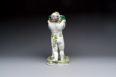 A French polychrome faience group with two Bacchus figures, Geo Martel, D&egrave;svres, early 20th C.