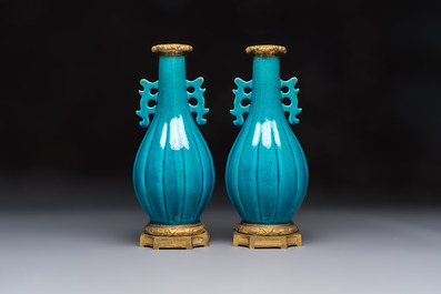 A pair of gilt-bronze-mounted Chinese turquoise-glazed vases, 19th C.