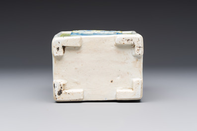 A Chinese famille rose relief-moulded rectangular brush pot with figural design, Yongzheng