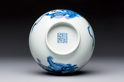 A Chinese blue and white 'Bleu de Hue' bowl with mythical beasts, Nguyen 阮 mark, 19th C.