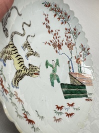 A Chinese famille verte Kakiemon-style 'Boy and Tigers' lobed dish, Kangxi