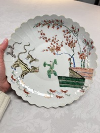 A Chinese famille verte Kakiemon-style 'Boy and Tigers' lobed dish, Kangxi