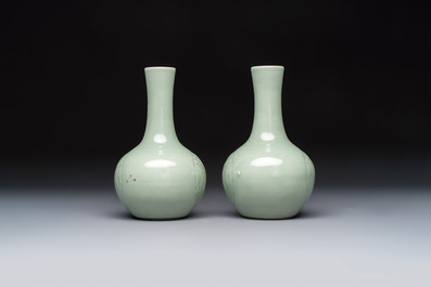A pair of Chinese celadon-glazed bottle vases with incised phoenix design, Yongzheng mark, 19th C.