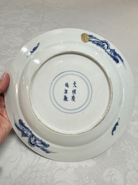 Five Chinese blue and white plates with narrative design, Chenghua mark, 19th C.