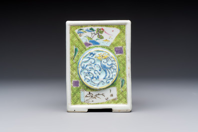 A Chinese famille rose relief-moulded rectangular brush pot with figural design, Yongzheng