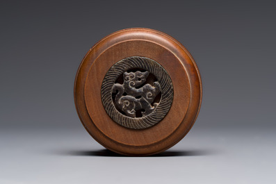 A Chinese blue and white 'Antiquities and Flower Baskets' vase with a wooden cover, Kangxi