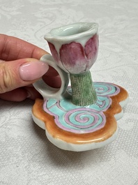 A pair of Chinese export famille rose lotus-form chambersticks on ruyi-shaped bases, Qianlong