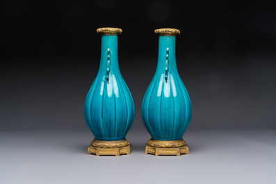 A pair of gilt-bronze-mounted Chinese turquoise-glazed vases, 19th C.