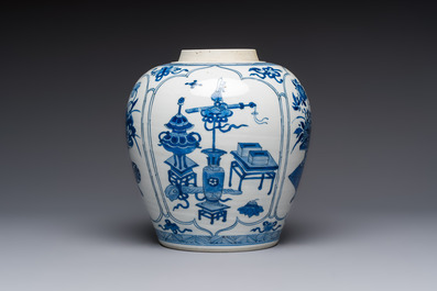 A Chinese blue and white 'Antiquities and Flower Baskets' vase with a wooden cover, Kangxi
