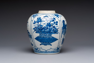 A Chinese blue and white 'Antiquities and Flower Baskets' vase with a wooden cover, Kangxi