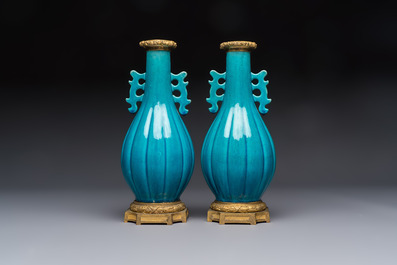 A pair of gilt-bronze-mounted Chinese turquoise-glazed vases, 19th C.