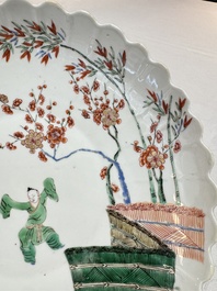 A Chinese famille verte Kakiemon-style 'Boy and Tigers' lobed dish, Kangxi