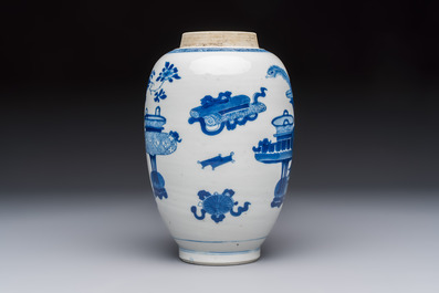 A Chinese blue and white ovoid 'Antiquities' jar with a wooden cover, Kangxi