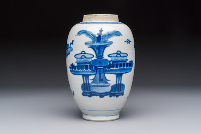 A Chinese blue and white ovoid 'Antiquities' jar with a wooden cover, Kangxi