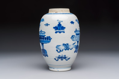 A Chinese blue and white ovoid 'Antiquities' jar with a wooden cover, Kangxi