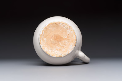 A French white-glazed puzzle jug, Nevers, 18th C.