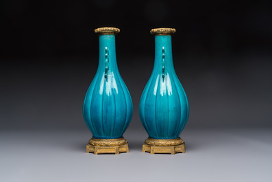 A pair of gilt-bronze-mounted Chinese turquoise-glazed vases, 19th C.