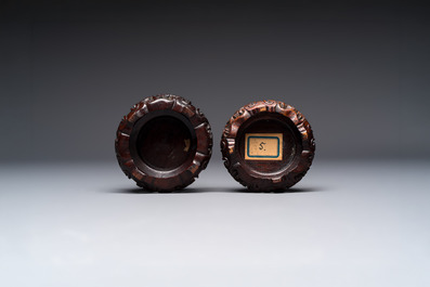 A pair of Chinese blue and white 'Buddhist Lions' triple gourd vases on reticulated wooden stands, 19th C.